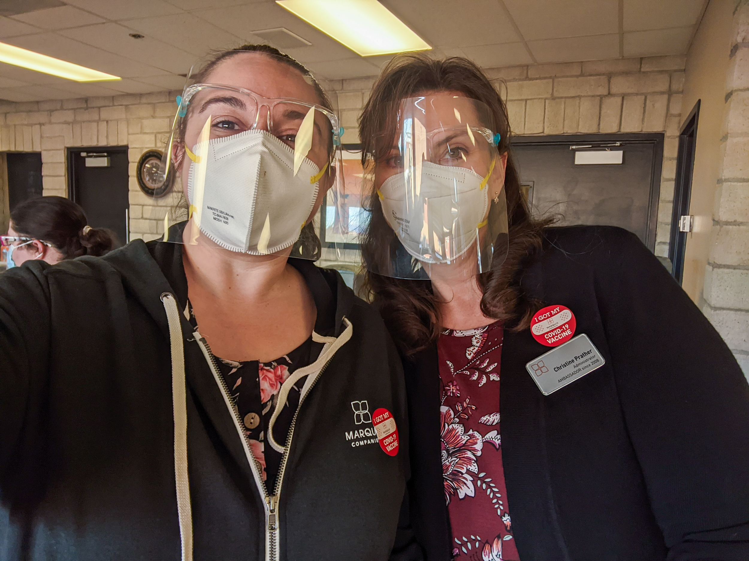 Marquis Plum Ridge Administrator, Christine Prather, and Business Office Manager, Vanessa Morrow, show off their "I Got My COVID-19 Vaccine" stickers.