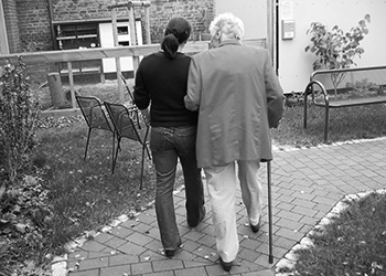 senior-woman-walking-with-friend