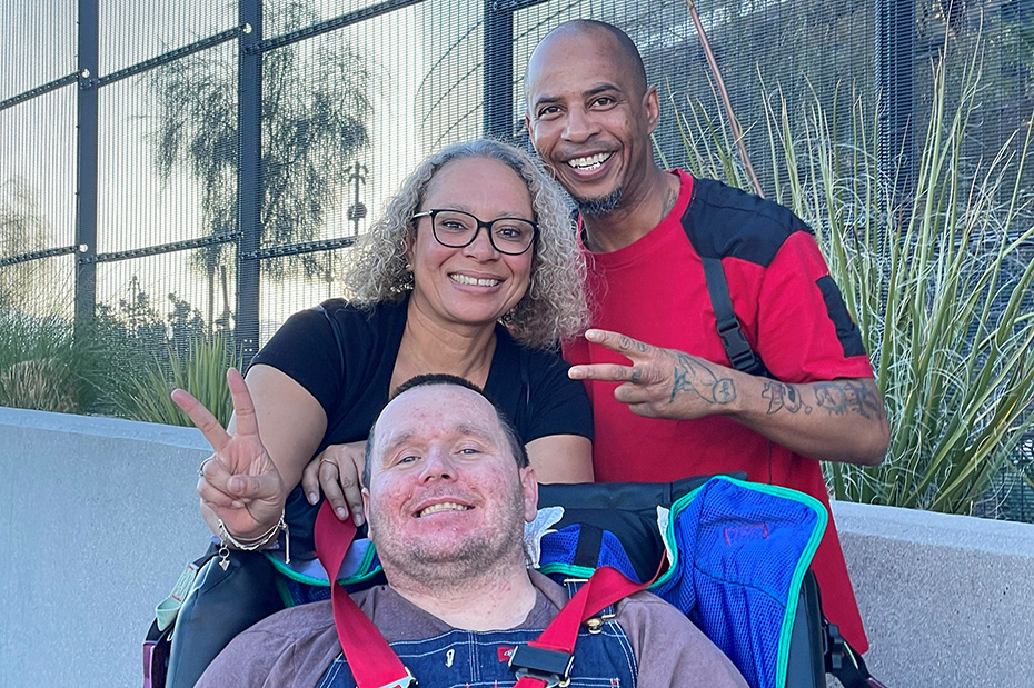 Marquis Plaza Regency resident Randy Anderson attends a Red Hot Chili Peppers concert in Las Vegas with caretakers Linda and Dion.